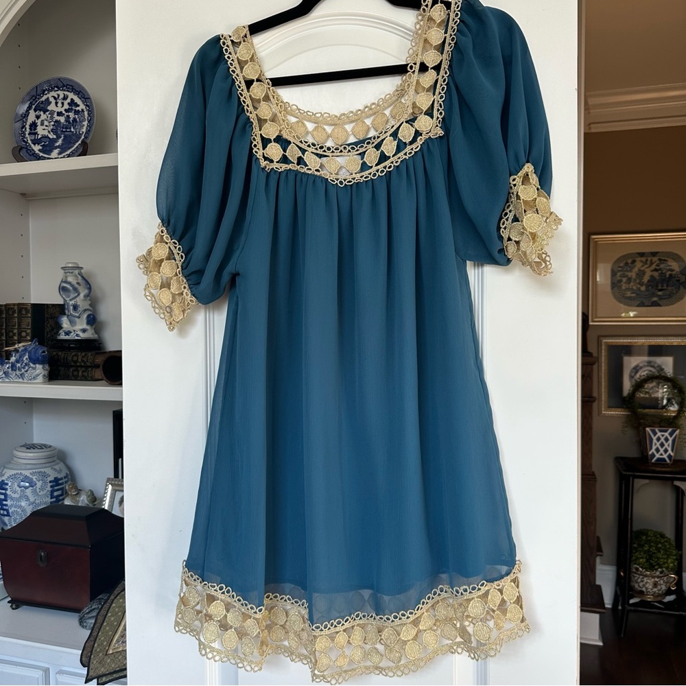 BIZZ PRINCESS - Blue flare dress with metallic gold lace at neck, bottom, sleeve
